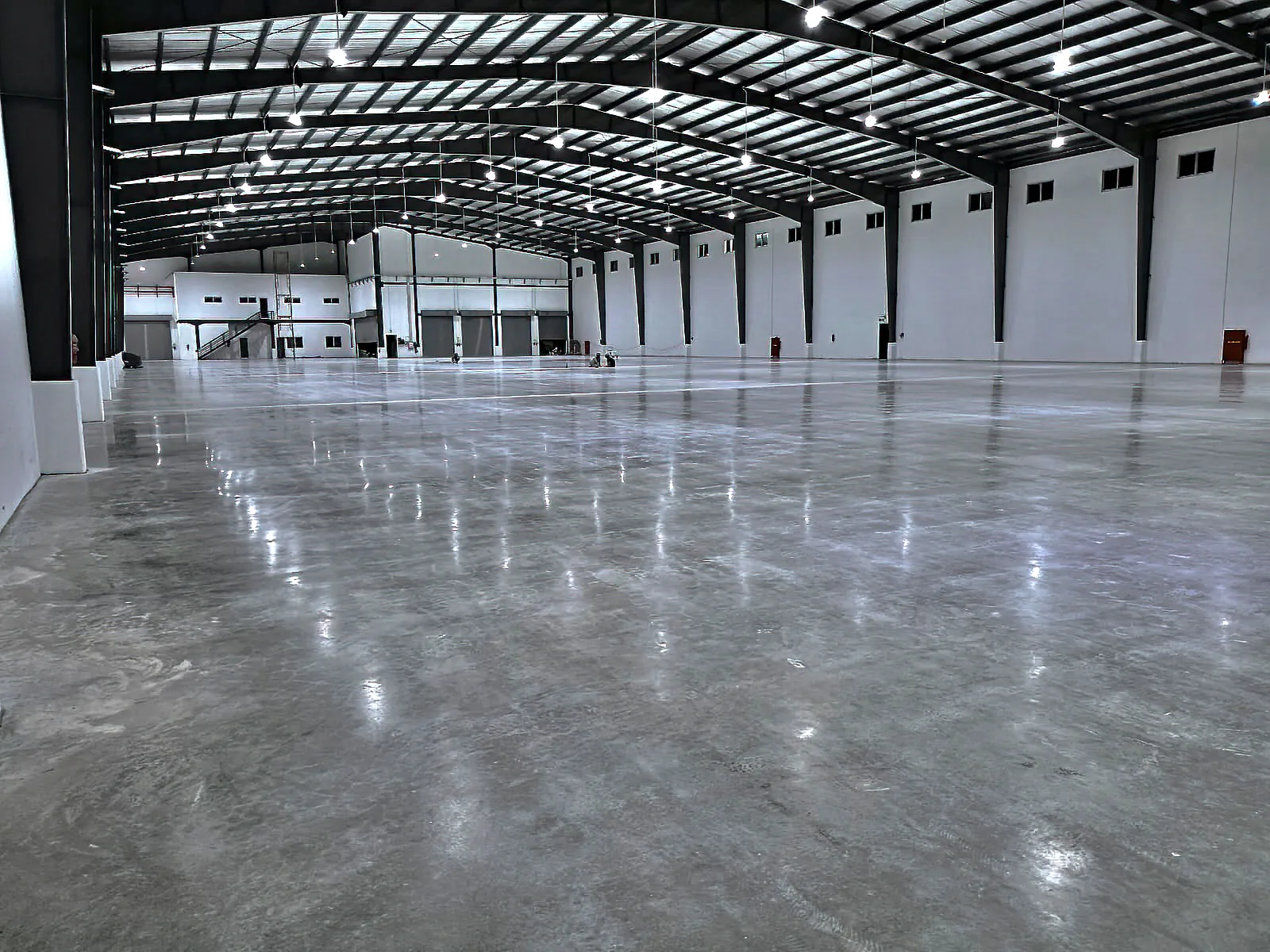 Large industrial warehouse with a finished concrete floor