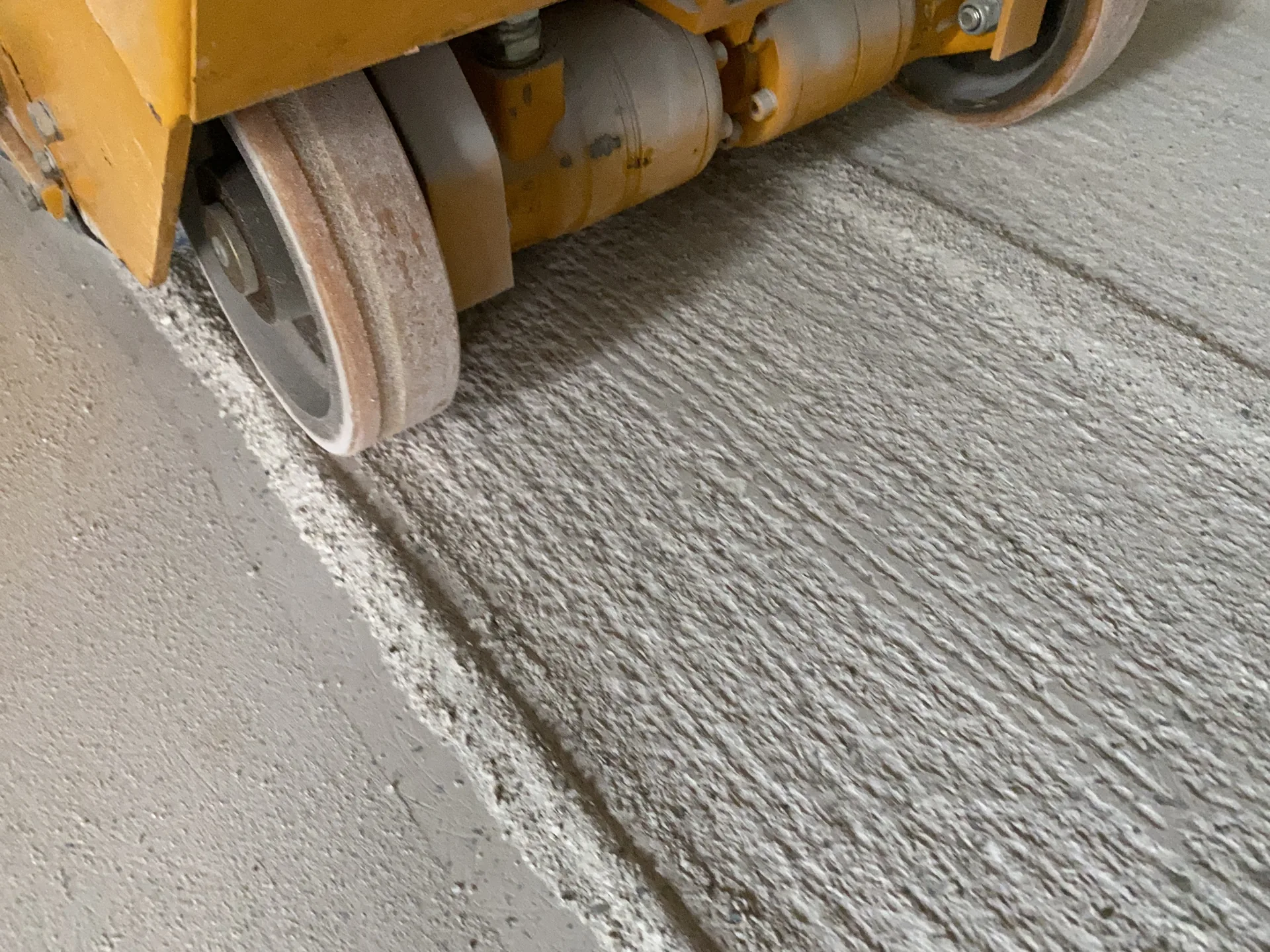 Floor preparation equipment working directly against the concrete surface